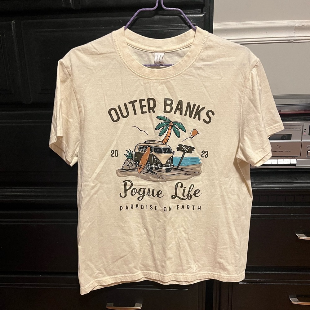 A cream tee-shirt worn twice bought from temu